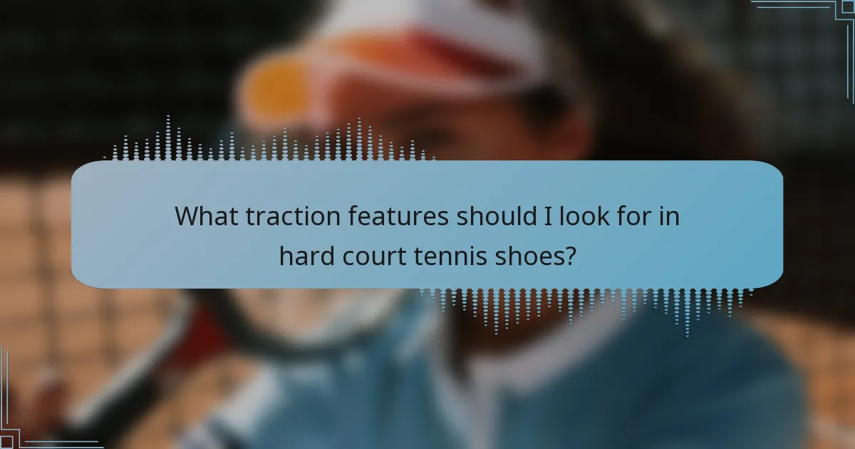 What traction features should I look for in hard court tennis shoes?